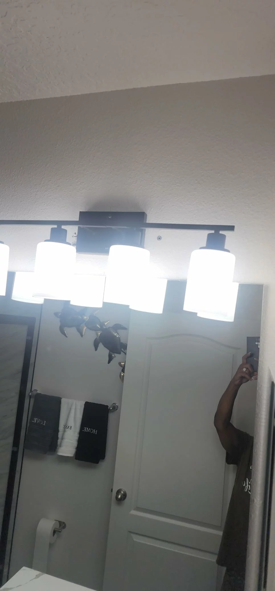 Click to view full screen MOKATNG 4-Light Bathroom Vanity Light Fixtures - Matte Black Wall Lamp with Milky White Glass Shades, Modern Bathroom Light Over Mirror for Living Room, Bedroom, and Cabinet photo review