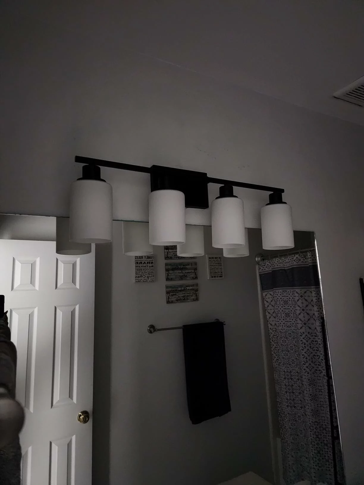 Click to view full screen MOKATNG 4-Light Bathroom Vanity Light Fixtures - Matte Black Wall Lamp with Milky White Glass Shades, Modern Bathroom Light Over Mirror for Living Room, Bedroom, and Cabinet photo review