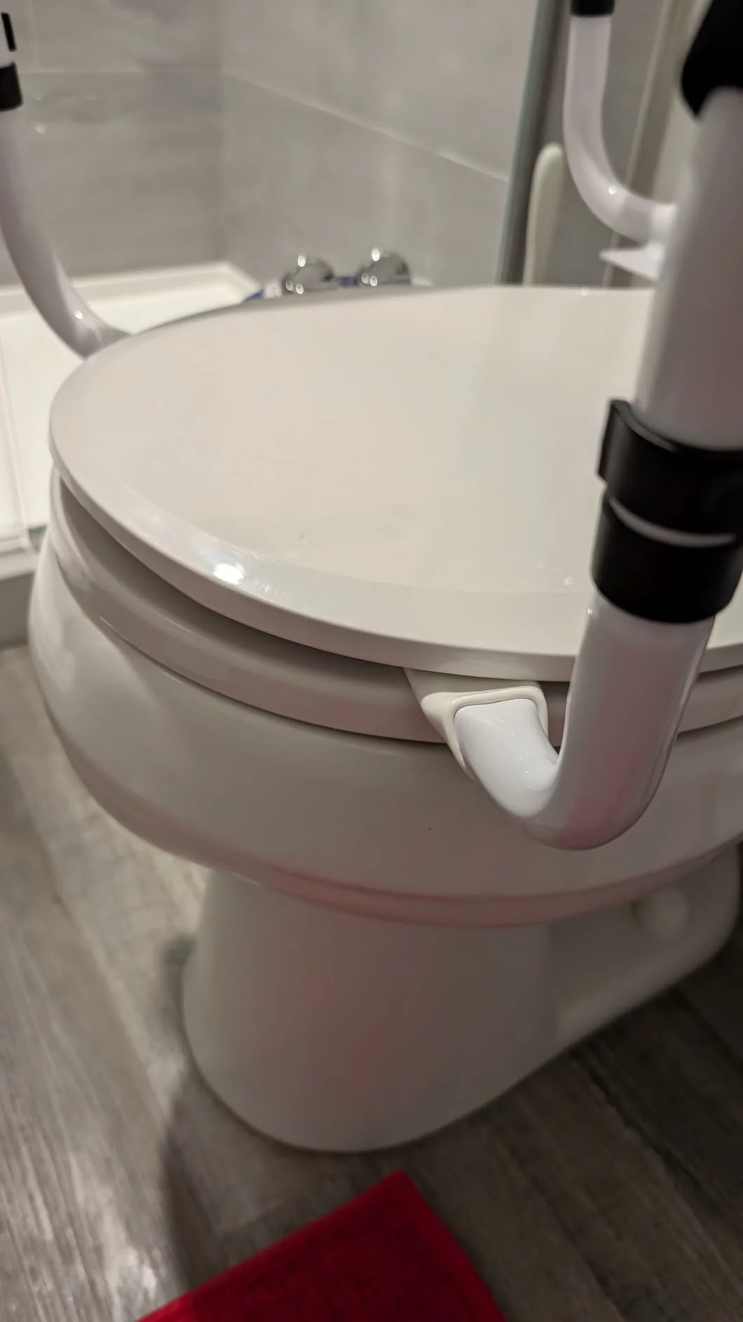 Click to view full screen Toilet Safety Rail with Grab Bar – Adjustable Black and White Frame for Elderly, 350lb Capacity photo review