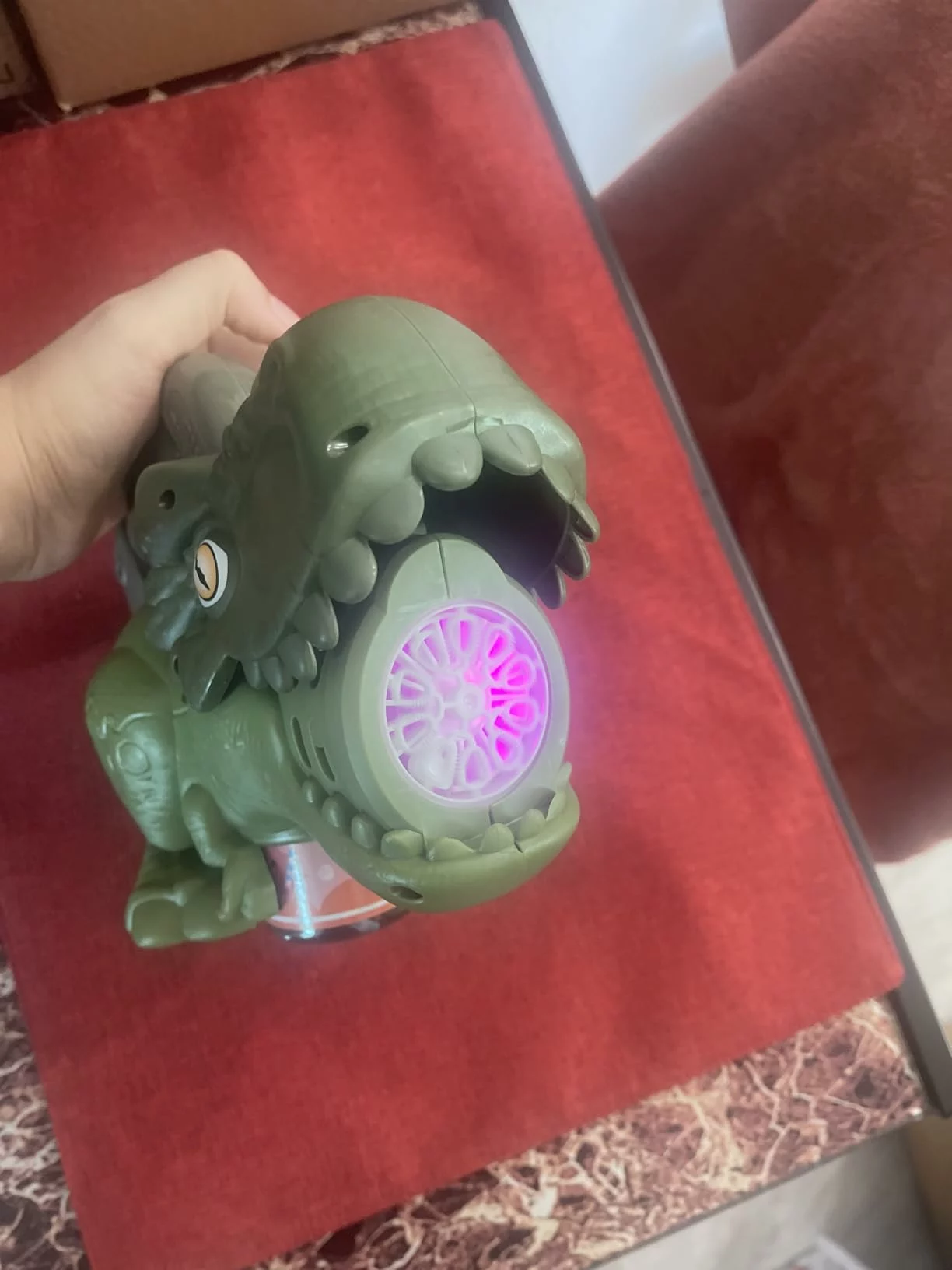 Click to view full screen Dinosaur Bubble Machine with Lights, Automatic Handheld Bubble Toy 20000+ Bubbles/Min for Kids Outdoor Party Yard Fun Gift photo review