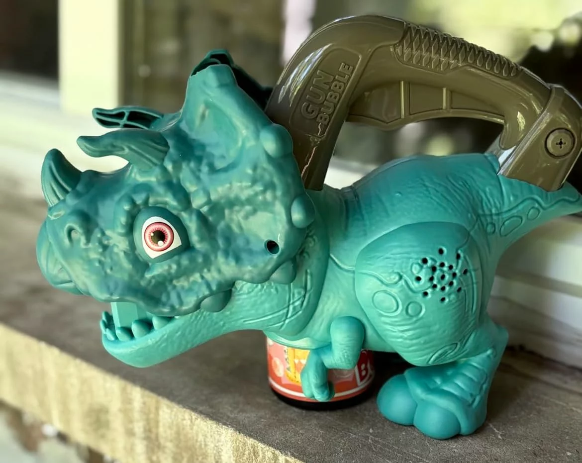 Click to view full screen Dinosaur Bubble Machine with Lights, Automatic Handheld Bubble Toy 20000+ Bubbles/Min for Kids Outdoor Party Yard Fun Gift photo review