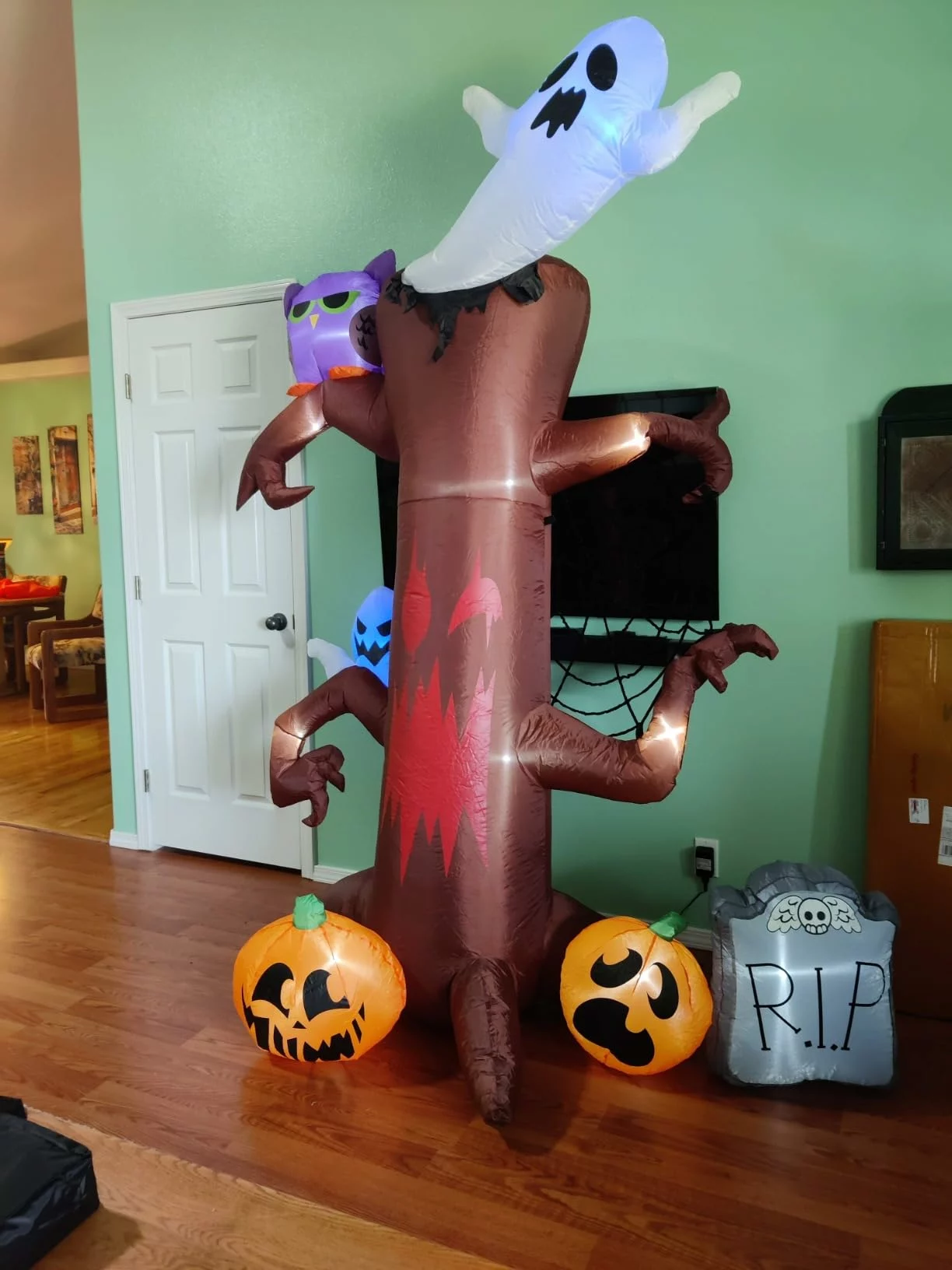 Click to view full screen Halloween Inflatable 8FT Tree with Pumpkin, Ghost, Owl, Spider Web & Tombstone, LED Lighted Blow Up Outdoor Yard Lawn Decor photo review