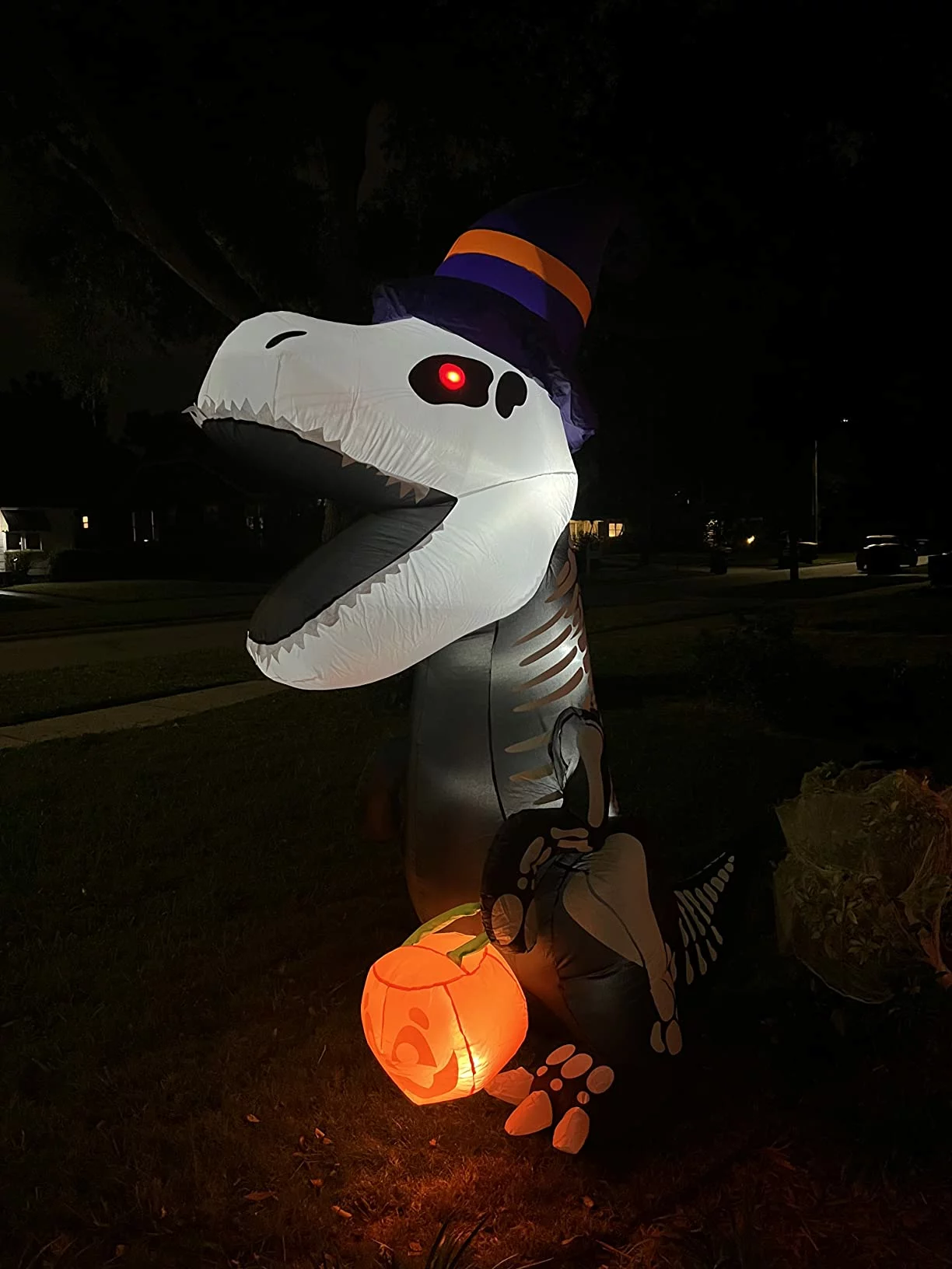 Click to view full screen Joiedomi 8FT Halloween Inflatable Skeleton Dinosaur with Pumpkin, LED Light Up Blow Up Yard Decoration for Outdoor Lawn photo review