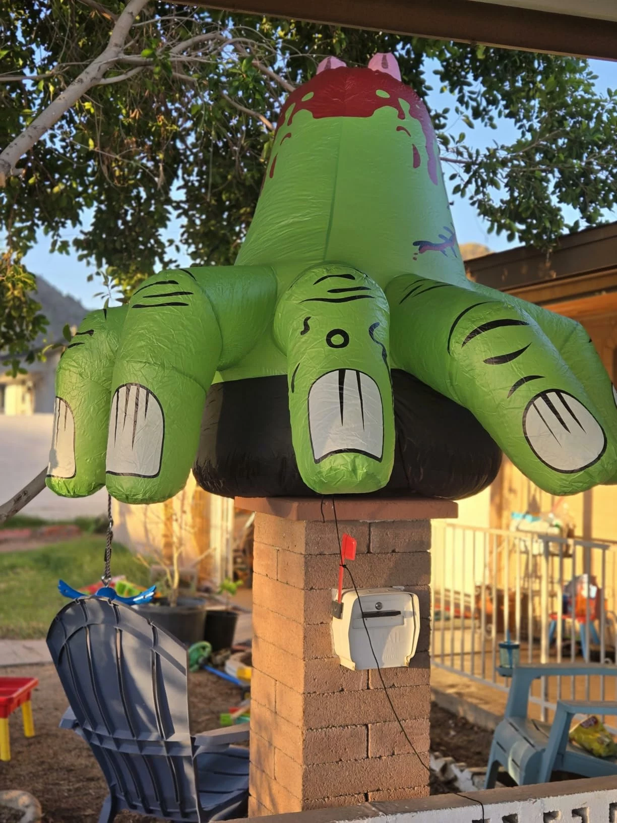 Click to view full screen GOOSH 6 FT Halloween Inflatables Hand Blow Up Yard Scary Green Giant with Built-in LEDs Garden Lawn Decor photo review