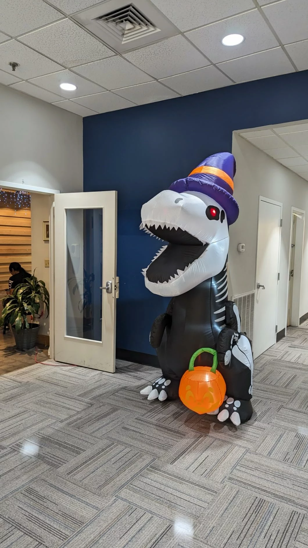 Click to view full screen Joiedomi 8FT Halloween Inflatable Skeleton Dinosaur with Pumpkin, LED Light Up Blow Up Yard Decoration for Outdoor Lawn photo review