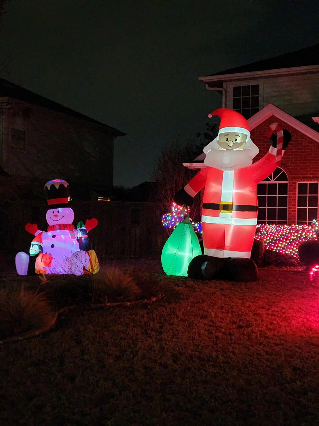 Click to view full screen 12FT by 7.6FT Giant Santa Claus Inflatable – Lighted Christmas Blow Up Yard Decor with Gift Bag for Outdoor Lawn, Garden & Holiday USA photo review