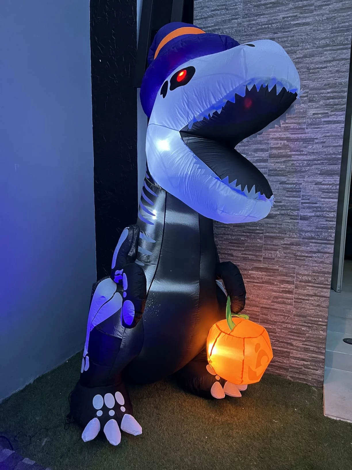 Click to view full screen Joiedomi 8FT Halloween Inflatable Skeleton Dinosaur with Pumpkin, LED Light Up Blow Up Yard Decoration for Outdoor Lawn photo review