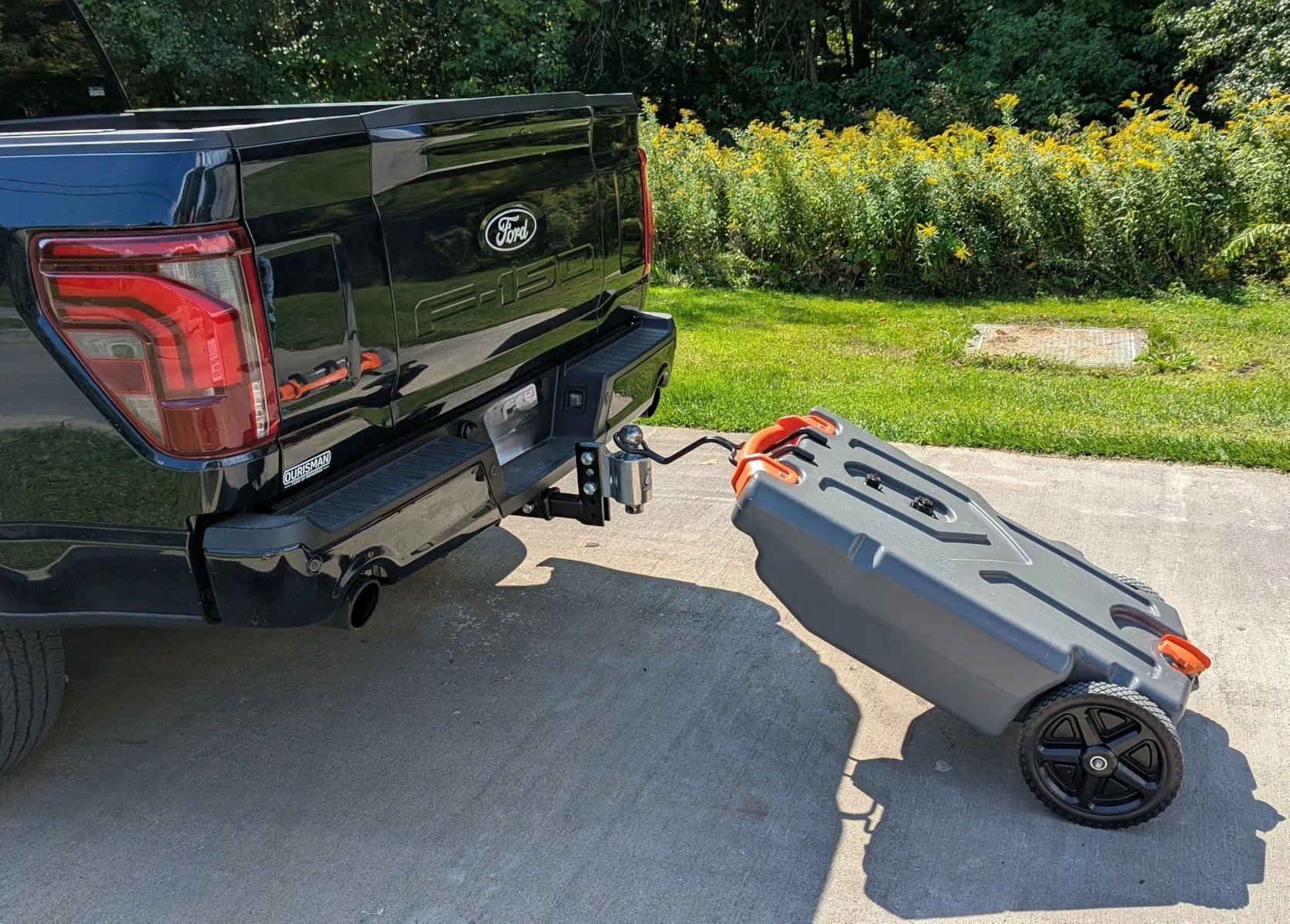 Camco Rhino 21-Gallon RV Portable Waste Tank – Large Capacity Tote with Tow Handle, Sewer Hose & Heavy-Duty Wheel Design photo review