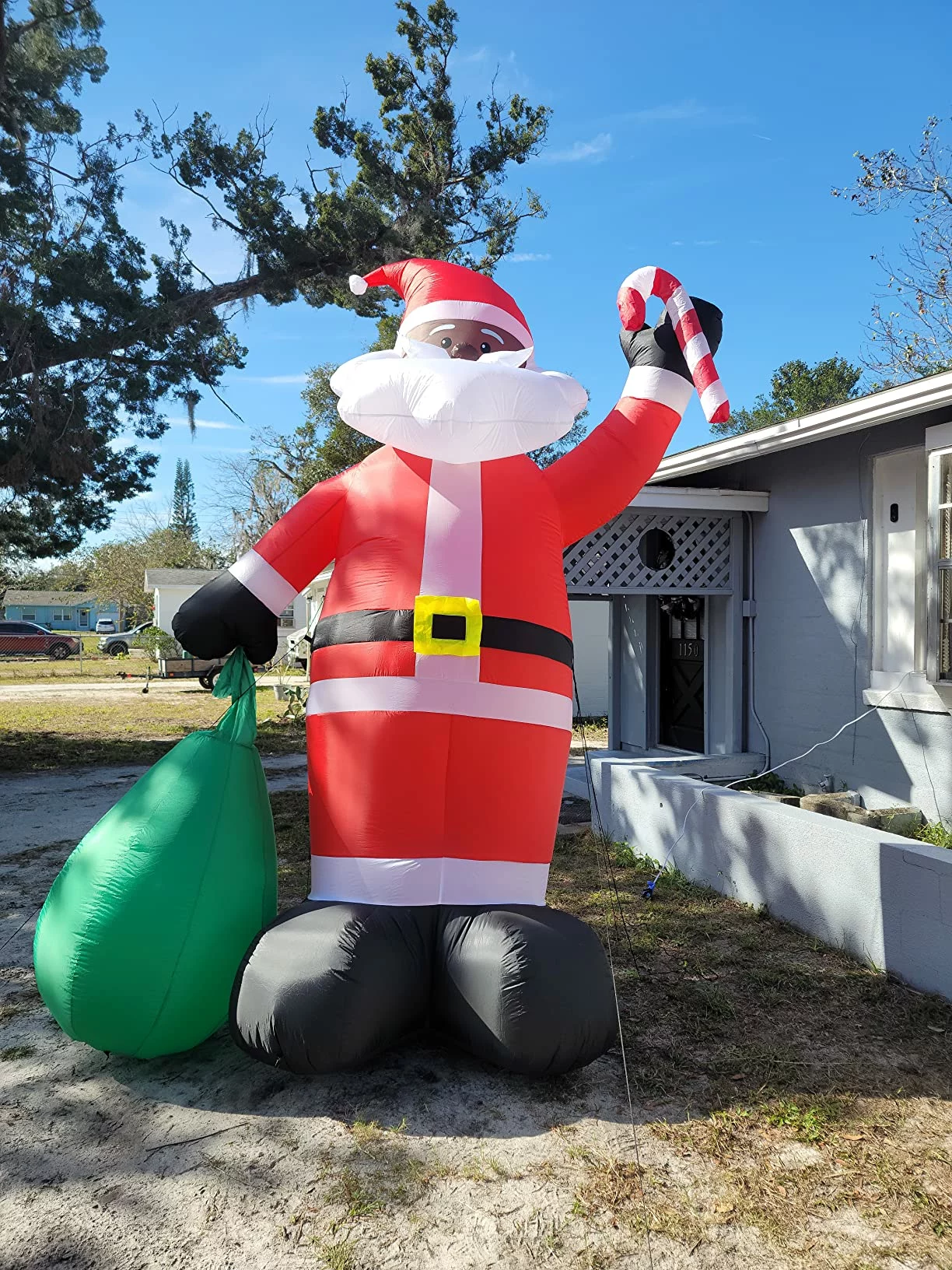 Click to view full screen 12FT by 7.6FT Giant Santa Claus Inflatable – Lighted Christmas Blow Up Yard Decor with Gift Bag for Outdoor Lawn, Garden & Holiday USA photo review